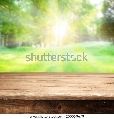 empty wooden table with sack and sunlight space