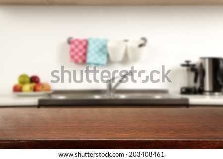 brown desk kitchen space and napkins