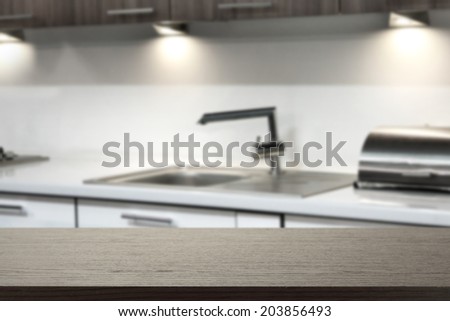 black desk in white kitchen