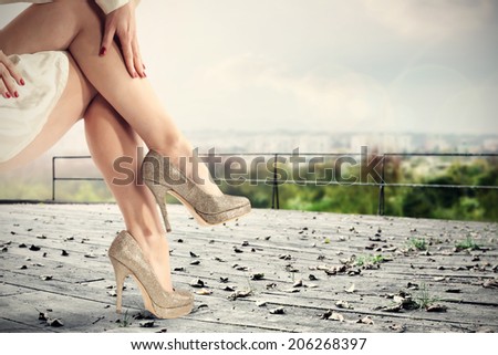 woman legs and deck