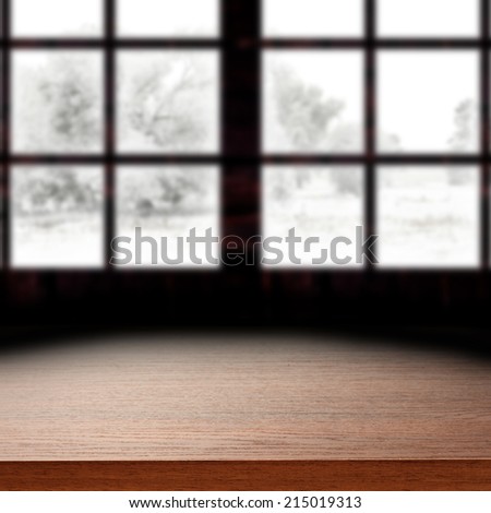 brown desk space and window space of winter