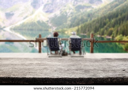 retro gray desk and autumn landscape of mountain and lake
