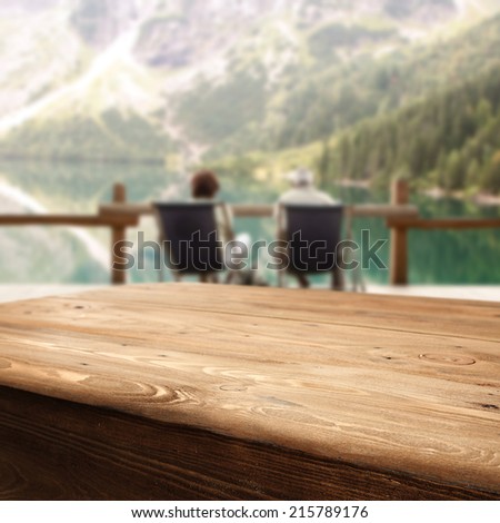 wooden terrace with wooden table