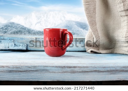 red mug and window