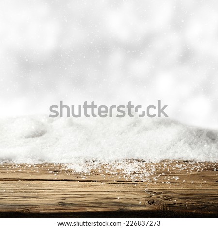 sill of wood and snow background