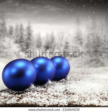 blue balls and landscape of trees