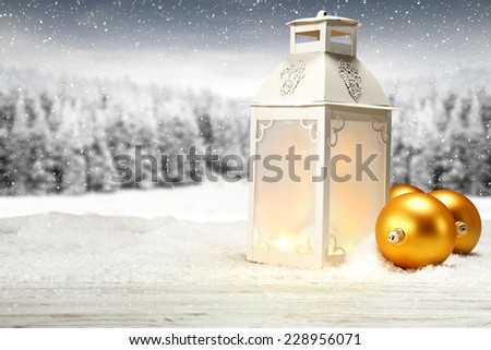 desk of snow and lamp and golden balls