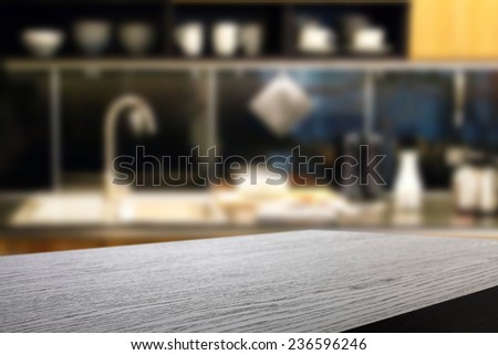 black desk in dark kitchen and space for you