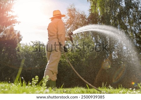 Similar – Image, Stock Photo Woman with water hose