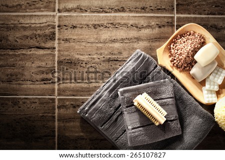 towels on floor and soap