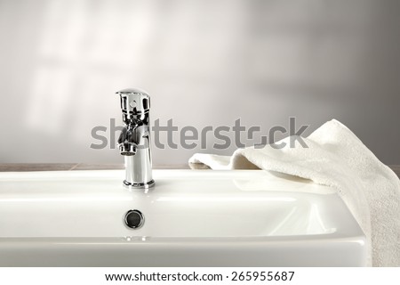 washbasin and white towel