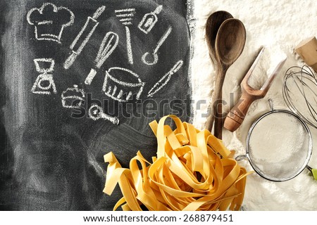 black chalkboard of flour and few chalk marks of food