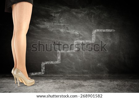 woman legs and dark floor