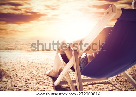 sunset and woman on chair