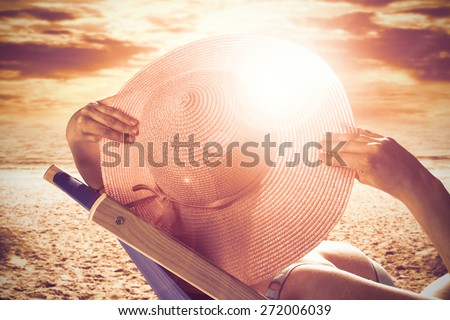 woman in hat and summer sunset