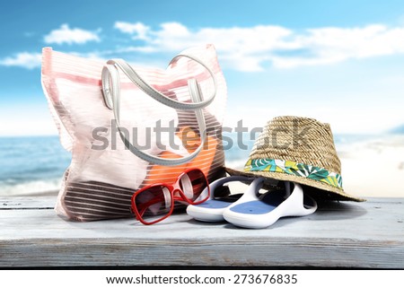 sunglasses hat and pink bag