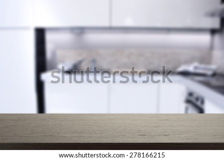 black desk space in white kitchen