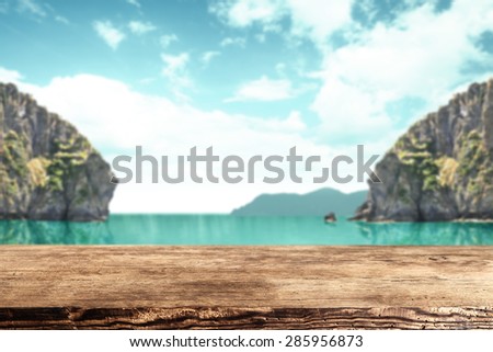 ocean background with coast and dark brown desk place