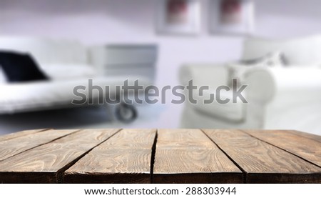 blurred background of sofa and dark table