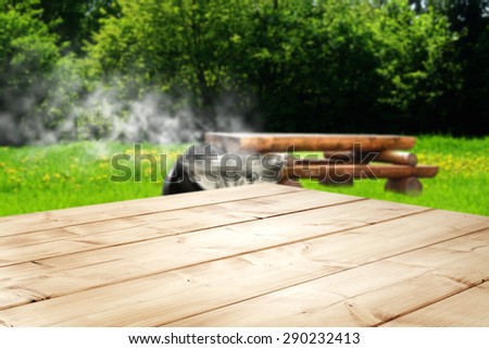 top of wood and grill with smoke