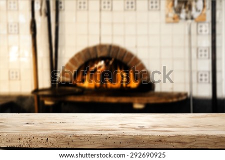 desk of wood fireplace and space for your pizza