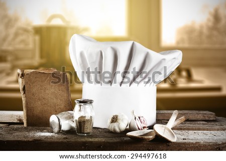 wooden board of cook hat and kitchen