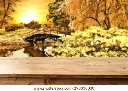 desk of wood and natural autumn landscape