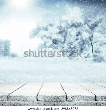 free space for your decoration of cold white board and blue landscape of forest and sun