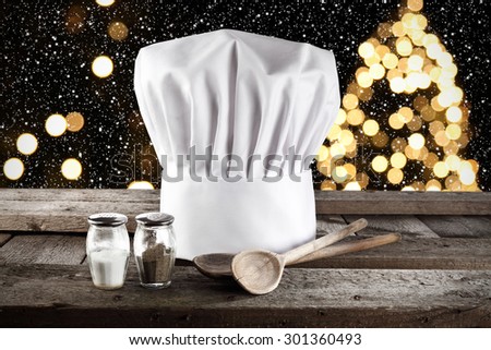 wooden spoons and cook hat