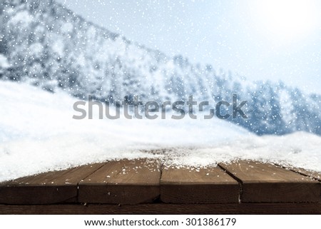 mountains wooden table and snow space