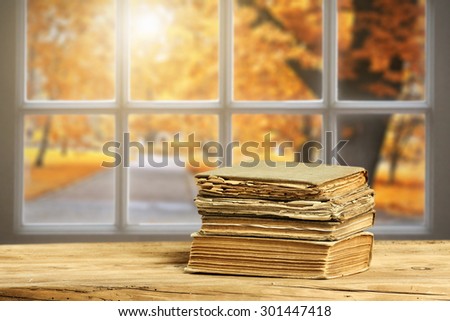 space on window sill and books