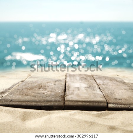 wooden board sea and sand with sun