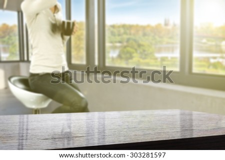 wooden board of free space and woman on chair