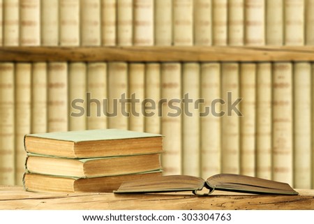 few books on top and books background