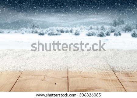 wooden table oof snow