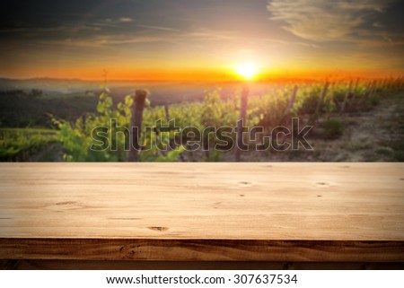 desk top of wood and sunset space