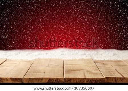 red xmas background space and table with snow