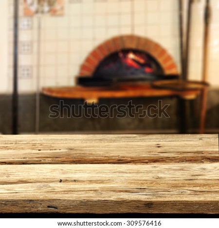 blurred background of fireplace and retro kitchen desk of shabby chic