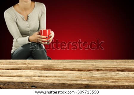 shabby desk top and woman with red mug