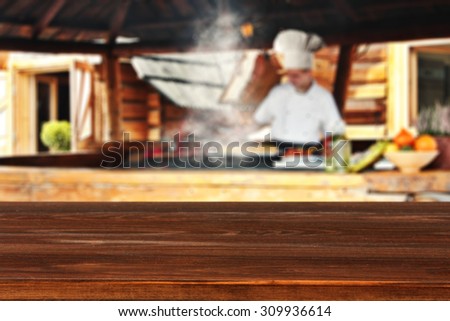 red desk of wood and cook