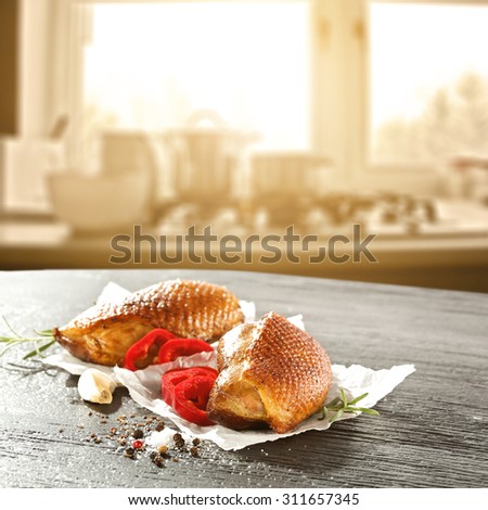 blurred background of window and sunlight with duck meat on paper