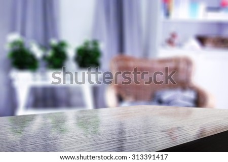 blurred blue texture of home interior and black desk