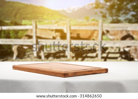 wooden kitchen desk and white tablecloth