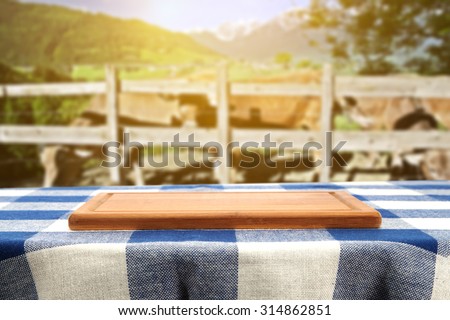empty kitchen desk tablecloth and cows