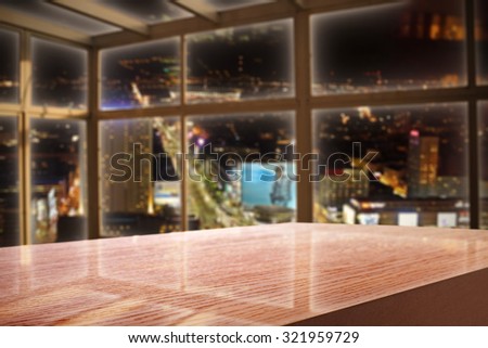 dark interior with window and city landscape at night with red wooden space for you