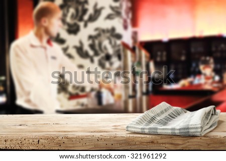 blurred background of bar and desk and napkin place