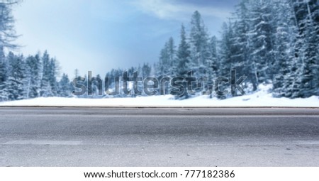 Similar – Foto Bild Winter verschneite leere Landstraße