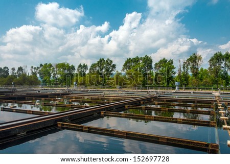 Water treatment facility with large pools of water