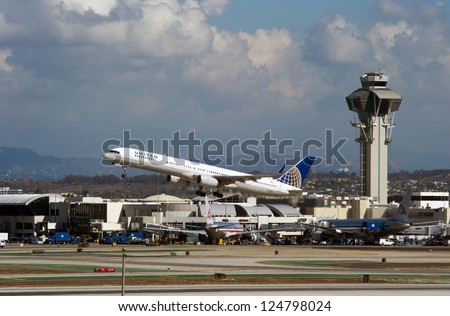 LOS ANGELES, CA - OCTOBER 23: A United Airlines passenger jet takes off from Los Angeles International Airport (LAX) in Los Angeles, CA on October 23, 2012. United is the largest airline in the world.