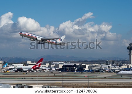 LOS ANGELES, CA - OCTOBER 23: An American Airlines passenger jet takes off from Los Angeles International Airport (LAX) in Los Angeles, CA on October 23, 2012. American may merge with US Airways.